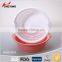colorful round plastic kitchen fruit sieve with tray