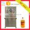 Doubel heads semi automatic coconut oil bottle filling machine