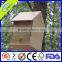 Antique hanging outdoor wooden bird cage