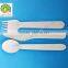 wood spoon wood fork wood knife with a napkin