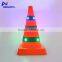 Retractable portable orange safety warning flashing traffic cone