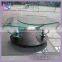 novel modeling clear bent glass coffee table swivel bar rack
