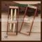 Two different Wooden WOOD Pens in wood folding stand