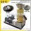 Family use wood pellet mill to make sawdust biofuel for burning stove