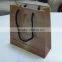luxury gold color handle shopping paper bag with high quality