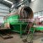 Large capacity stationary waste composting machine with hopper storage bin
