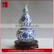 white and blue porcelain bottle gourd shaped bottles