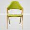 green color fabric indoor wood chair