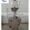 Vertical type constant temperature liquid wax filling machine with mixer and hopper