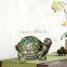 Ceramic tortoise shape battery operated luminary with inner color changing led candle for night decoration