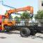 hand operated lifting equipment on truck, Model No.:SQ8S4, 8ton truck crane with telescopic booms.