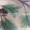 Plastic pine branch with cone