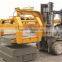 Forklift road edge stone clamp