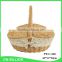 Woven wicker material food hamper with foldable lid