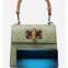 Hot-selling ostrich print manual small package ladies trapezoid bamboo-handle handbag