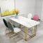 Modern marble top golden chrome leg long dining table for restaurant