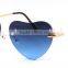 Rimless heart shape sunglasses with mirror lens .