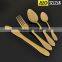 Gold plated flatware with rose design and wooden box