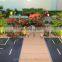 Dinosaur park architectural maquette for real estate & construction display with miniature people