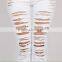 2016 Women Pants Ladies Casual White and Black With Waist-length Ripped Distressed Skinny Female Jeans