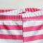 pink and white child swimwear