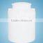 Storage tanks and white chemical plastic drums