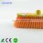 small plastic broom with printing