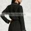 Lady Woven surplice neckline notched lapels an elasticized waist long sleeves a center-back pleat and contrast piping romper