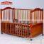 Safety standards convenient design baby crib attached bed with removable wheels