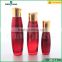 30/110/135ml red glass clear lotion cosmetic bottle with pump                        
                                                                                Supplier's Choice