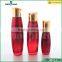 30/110/135ml red glass clear lotion cosmetic bottle with pump                        
                                                                                Supplier's Choice