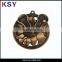 Nickle free metal medal with brass plating