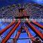 outdoor park rides carnival Vintage Ferris Wheel at night