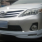 The Toyota Corolla car is surrounded by a 11-13 Carora front and rear spoiler skirt