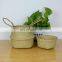 Cheap wall basket decor hanging rattan seagrass woven handmade natural hanging baskets for plants outdoor