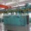 Overhead rail conveyor products cleaning machine