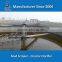 Bridge supported primary clarifier in water settlement tank