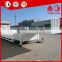 Cheap price 4 axle low bed semi trailer 100 ton 120 tons low bed truck trailer for sale