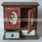Antique wooden case with photo openings