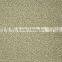 Machine tufted loop pile wall to wall carpet