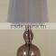 Finland chrome base bedside table lamp with electroplate lampstand and off-white barrel shade