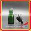 cosmetic dropper bottle wholesale with glass cosmetic serum dropper bottle with label