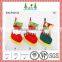 Green and red color christmas socks decoration