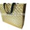 Embossed quilted handle bag with non woven laminated