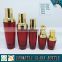 Red colored glass cosmetic bottle packaging and cosmetics cream empty jars