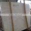White travertine tile and slab