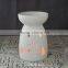 Hot sale porcelain white Christmas T-light oil burner with hollow design