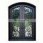 house entry big double glass arched eyebrow top black cast iron frame unique scrolls heavy duty front design wrought iron door
