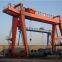 Boxed beam double girder gantry crane portal with saddles and cantilevers