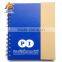 notebook with sticky notes and pen